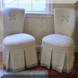 F35. Pair of upholstered button back chairs. 38”h x 22”w x 18”d - $125 each